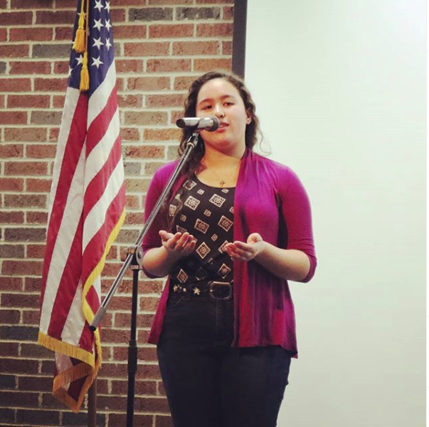 Cafe recites a poem during Poetry Out Loud