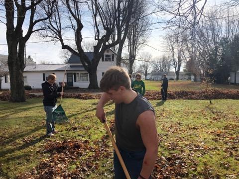 CBI Students Rake Leaves in Community