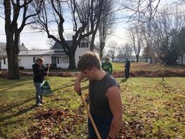 CBI Students Rake Leaves in Community